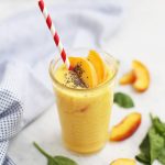 We love these Peach Mango Bliss Smoothies - A gorgeous peach mango smoothie that tastes like sunshine!