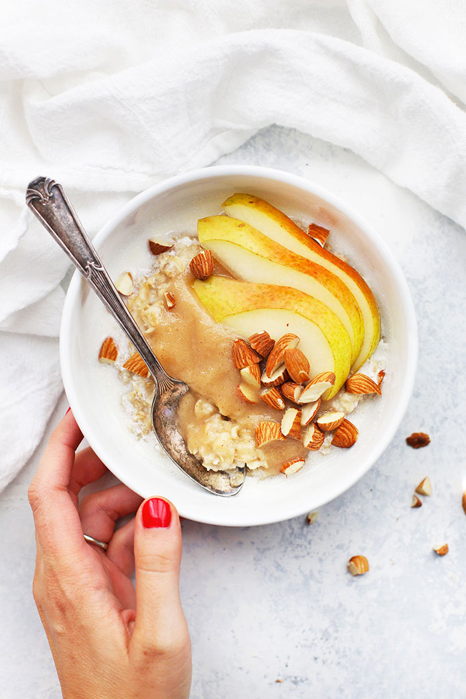 Slow Cooker Spiced Pear Sauce with Oatmeal and Almonds from One Lovely Life