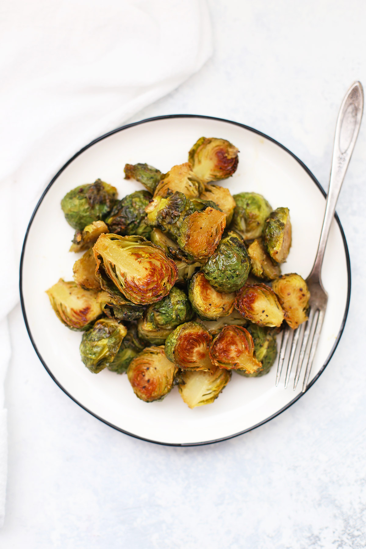 Roasted Maple Dijon Brussels Sprouts - the perfect healthy side dish! I love how caramelized these get. (Paleo, gluten free, vegan, vegetarian!) 