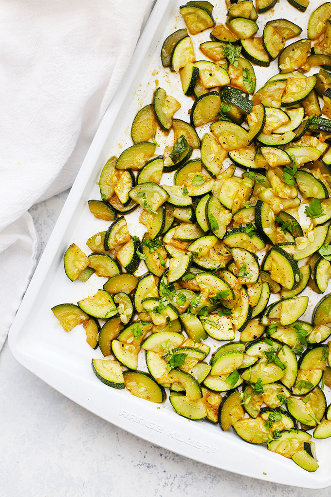 Chili Roasted Zucchini on a White Baking Sheet from One Lovely Life