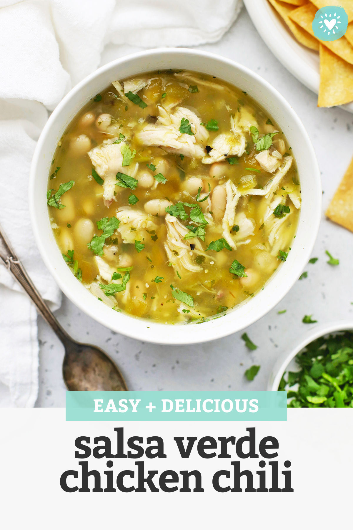 Salsa Verde Chicken Chili - This might be the EASIEST chili recipe ever! Just 7 ingredients + 15 minutes and you're ready to enjoy this lighter take on chili night. (Gluten-Free + Easy!) // White Chicken Chili // Healthy Chili Recipe // Chicken Chili Recipe // Healthy Soup