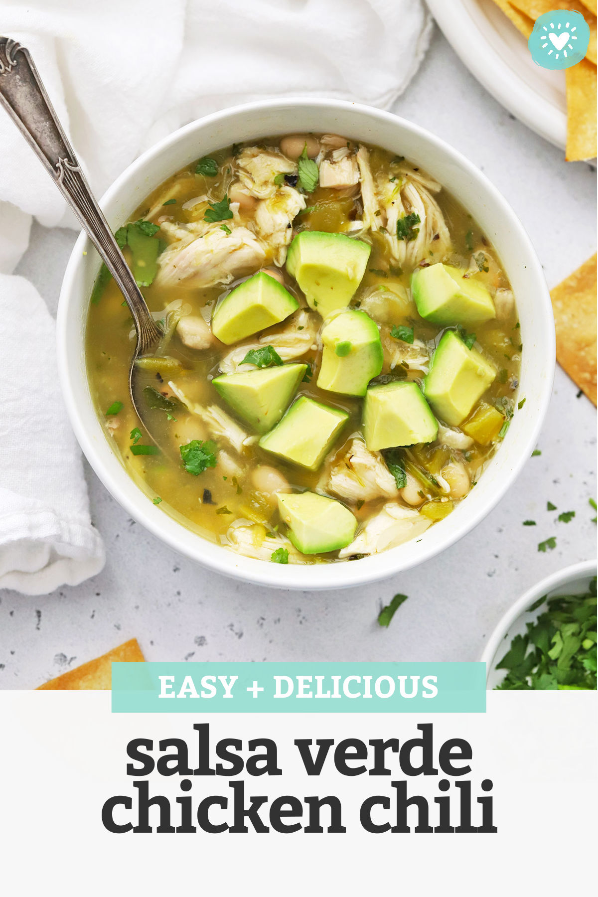 Salsa Verde Chicken Chili - This might be the EASIEST chili recipe ever! Just 7 ingredients + 15 minutes and you're ready to enjoy this lighter take on chili night. (Gluten-Free + Easy!) // White Chicken Chili // Healthy Chili Recipe // Chicken Chili Recipe // Healthy Soup #chili #chickenchili #whitechili #healthysoup