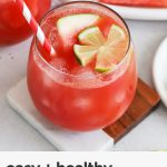 watermelon mocktail with watermelon and lime garnish