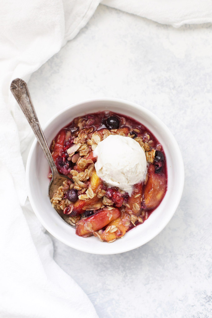 Peach Berry Crisp is the PERFECT summer dessert. This one is gluten free, vegan and absolutely delicious! 