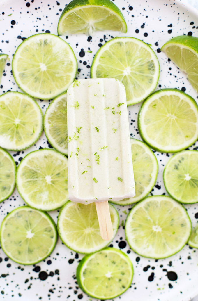 Paleo or Vegan Coconut Lime Popsicles - Dairy free, naturally sweetened, and so delicious! The perfect healthy popsicle recipe. 
