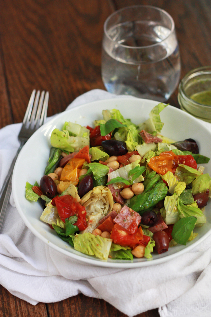 Italia Salad - Loaded with goodies and topped with lemon basil dressing. 