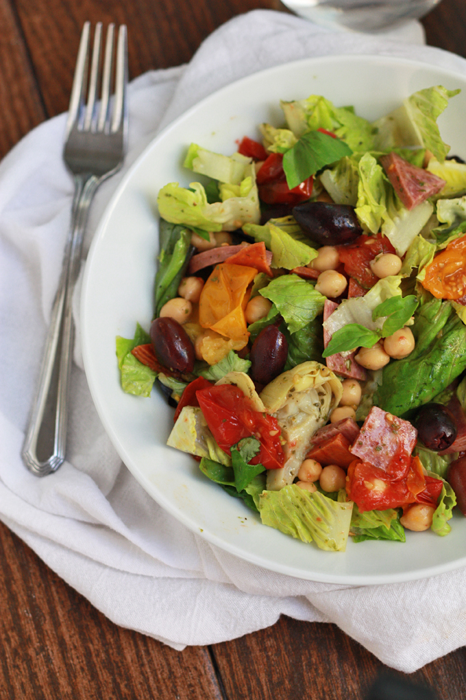 SO many goodies in this Italia Salad with Lemon Basil Dressing from www.onelovelylife.com