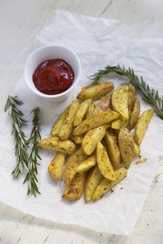 Crispy Herb Roasted Potatoes - These are full of flavor! Fancy enough for a nice dinner, easy enough for a weeknight. 