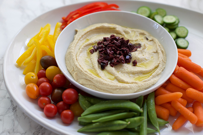 Beautiful and silky-smooth, this Artichoke and Olive Hummus is the perfect snack or party food. 