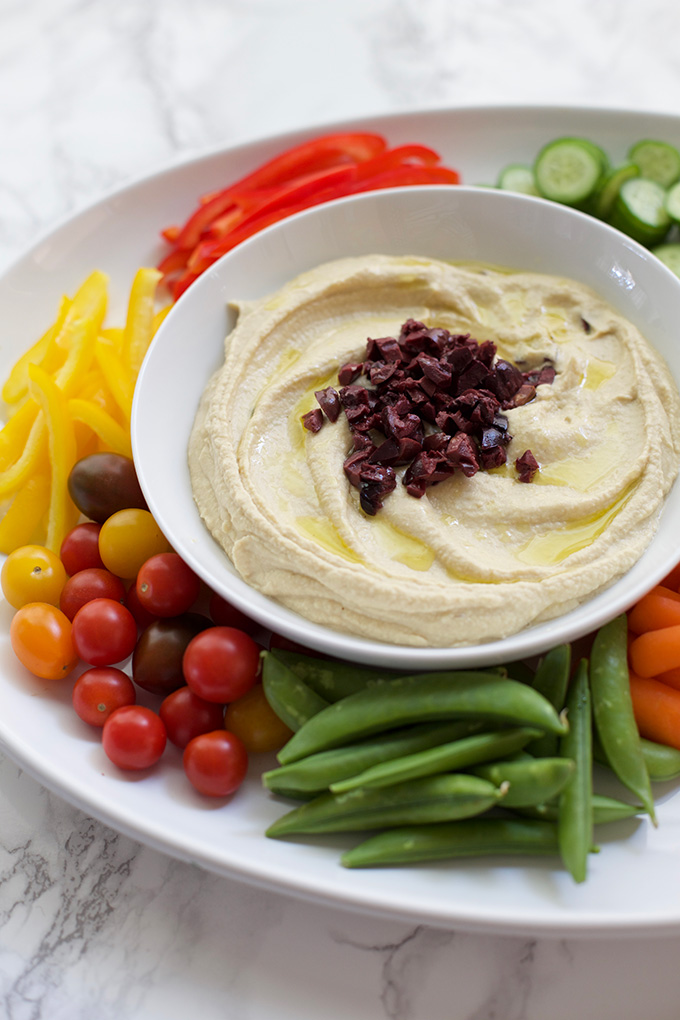 Silky-smooth texture and gorgeous flavor makes this healthy Artichoke and Olive Hummus feel like an indulgence. 