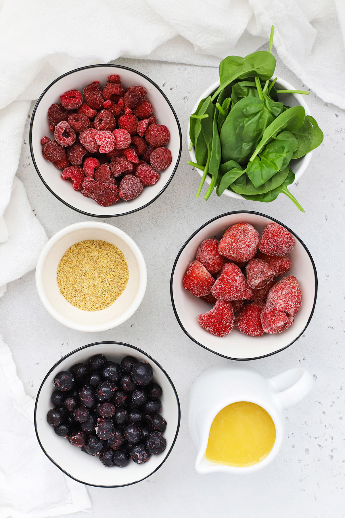 Overhead view of ingredients for berry smoothies