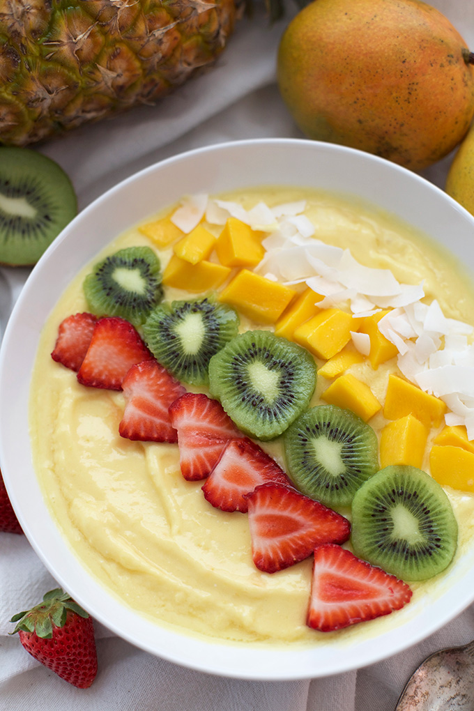 These Mango Smoothie Bowls are so creamy and luscious! Top them with your favorites for a fresh, healthy breakfast. 