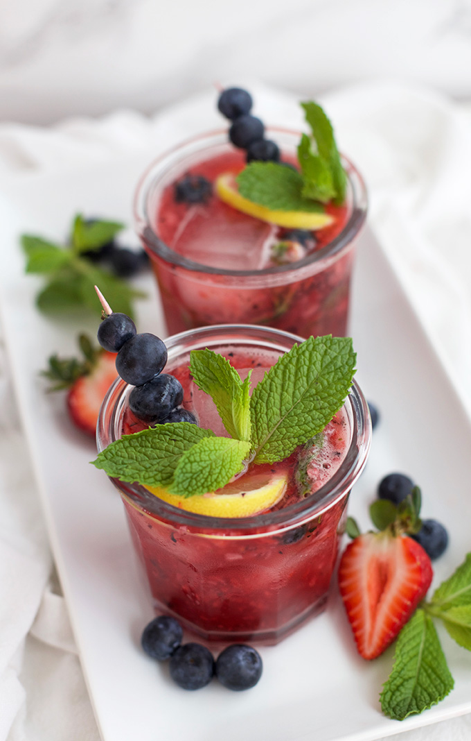 This Honey Sweetened Berry Lemonade is perfection. Sweet, fresh, flavorful. The perfect summer drink! 