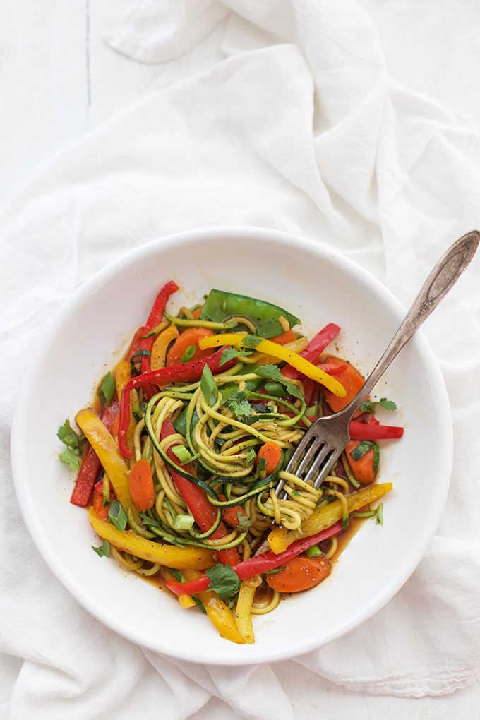 Zucchini Noodle Stir Fry with Spicy Black Pepper Sauce - as delicious as it is colorful. Paleo & vegan friendly! 