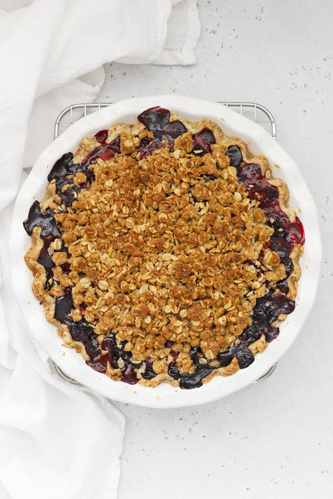 Overhead view of a triple berry crumble pie fresh from the oven