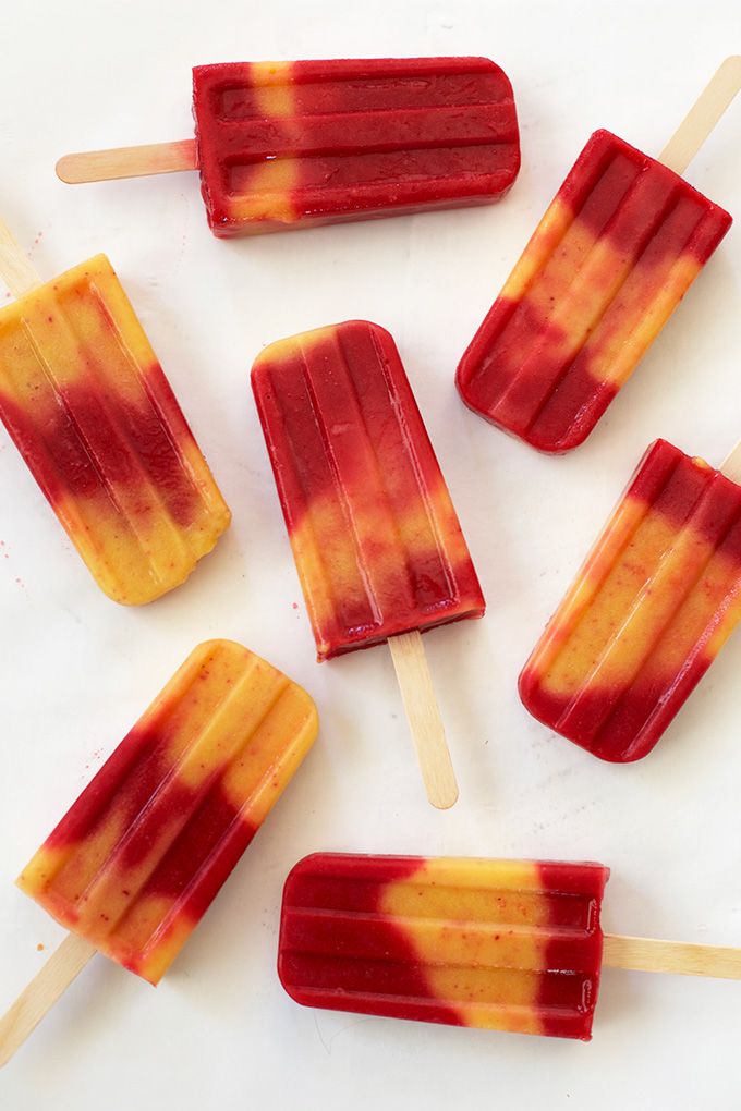 Homemade Raspberry Peach Popsicles. These are as yummy as they are pretty! (Gluten free & Vegan)