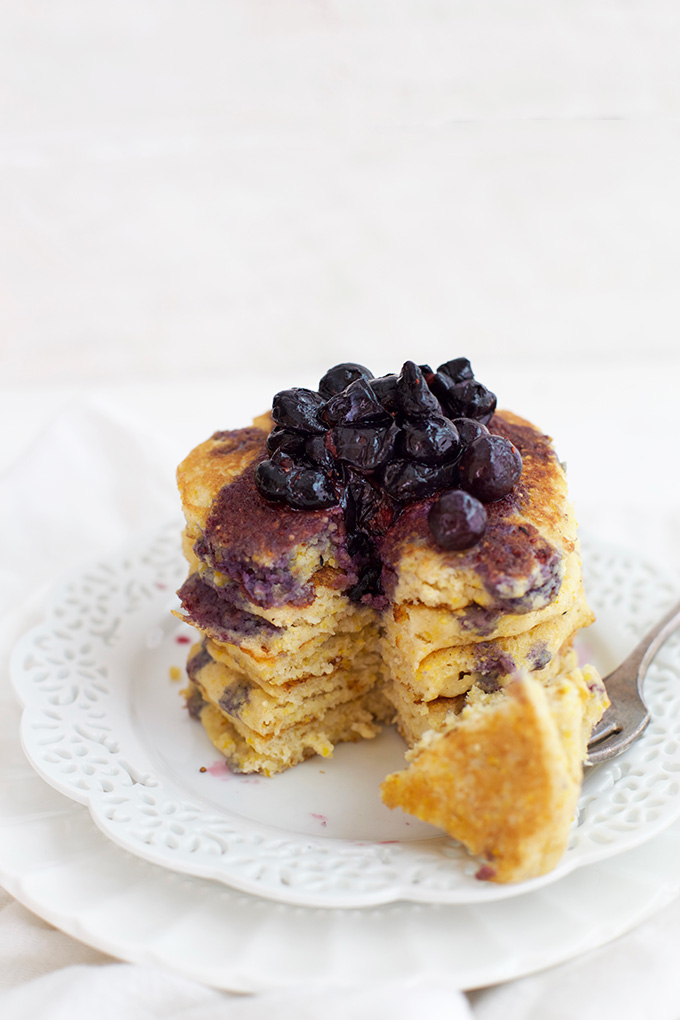 Simple, cozy, delicious. We love these Cornmeal Pancakes with Blueberry Maple Syrup