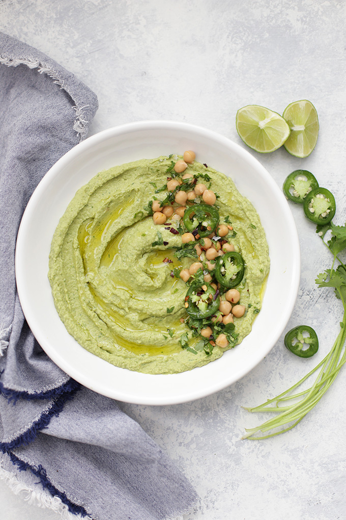 This bright, flavorful cilantro hummus is a perfect healthy dip! Use it for snacks, lunches, parties, or game day! 