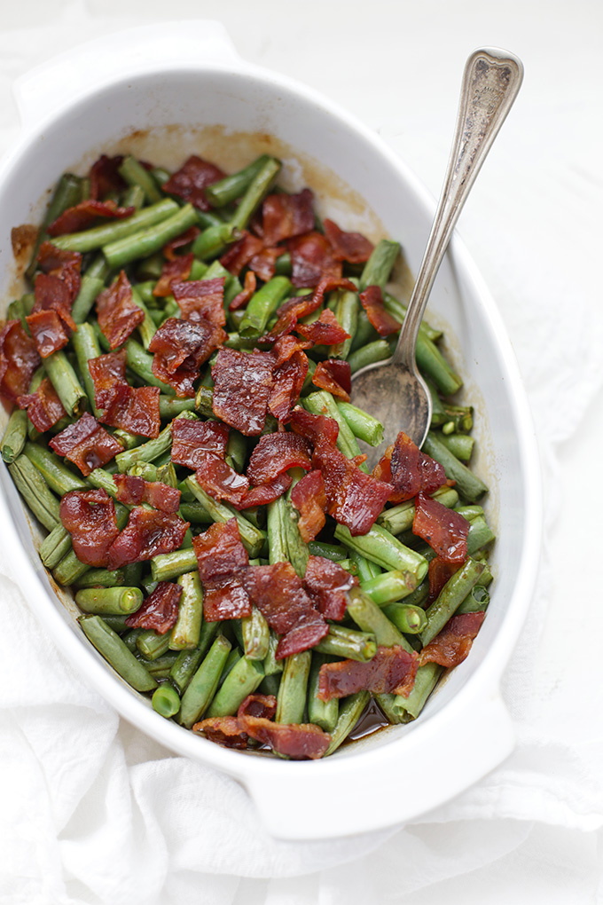 These smothered green beans with bacon are a great swap for green bean casserole. The sauce is amazing!