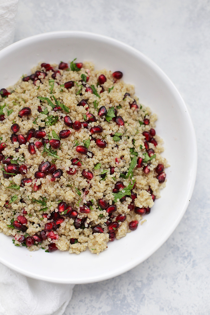 This Pomegranate, Cilantro, and Lime Quinoa is a beautiful, elegant, SIMPLE side dish perfect for a holiday dinner. (Plus, you can cook the quinoa in a rice cooker!) 