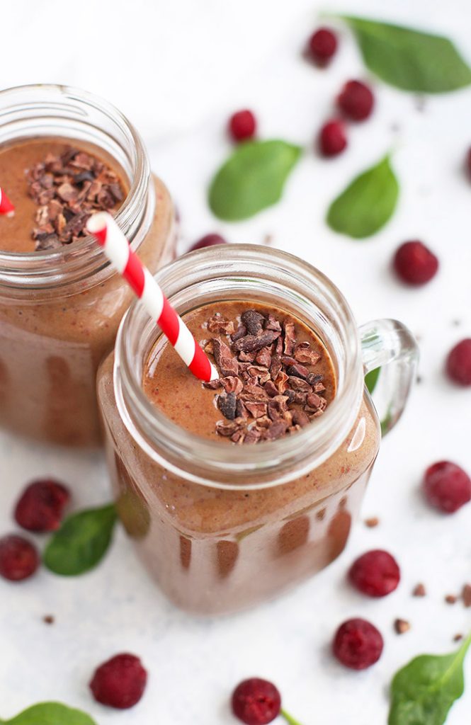 chocolate cherry smoothie topped with cacao nibs