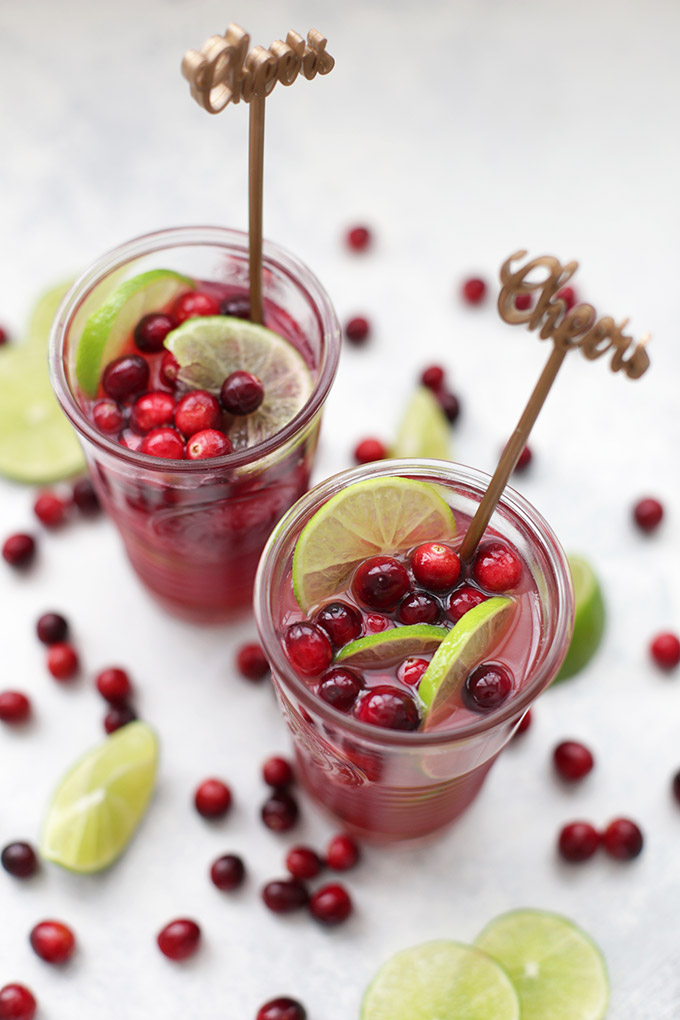 This Cranberry Lime Spritzer is the perfect holiday drink. It's a great mocktail for the holidays. There's no added sugar, and it even has protein in it (yes, I'm serious). 