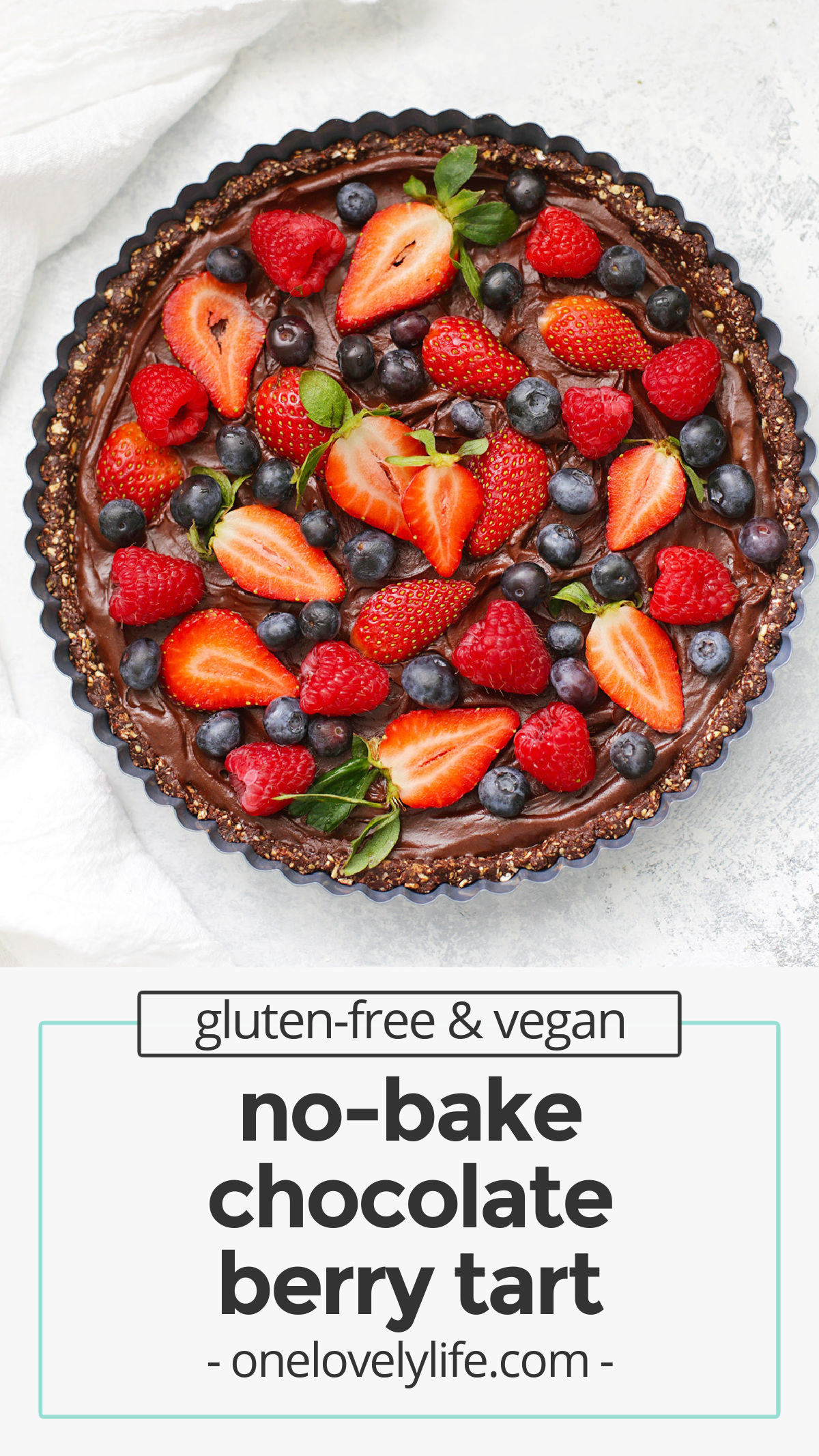 No Bake Chocolate Berry Tart - This gluten free vegan chocolate tart tastes so fresh and luscious. It's gluten free, dairy free, refined sugar free, and really makes a statement. The belle of the ball at any dinner or party! // Dairy free chocolate tart // gluten free chocolate tart // no bake desserts // Valentine's Day Dessert // healthy chocolate tart // no bake chocolate tart // gluten-free chocolate berry tart // dairy free chocolate tart recipe // valentine's day dessert