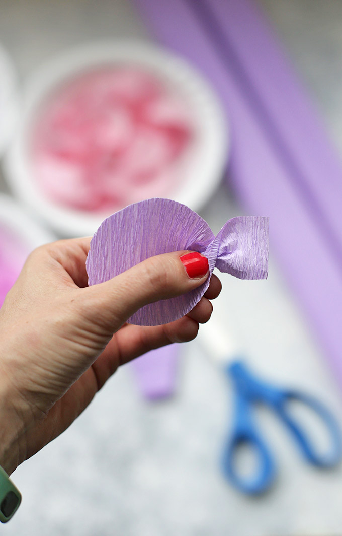 Twisting paper petals for Crepe Paper Wisteria