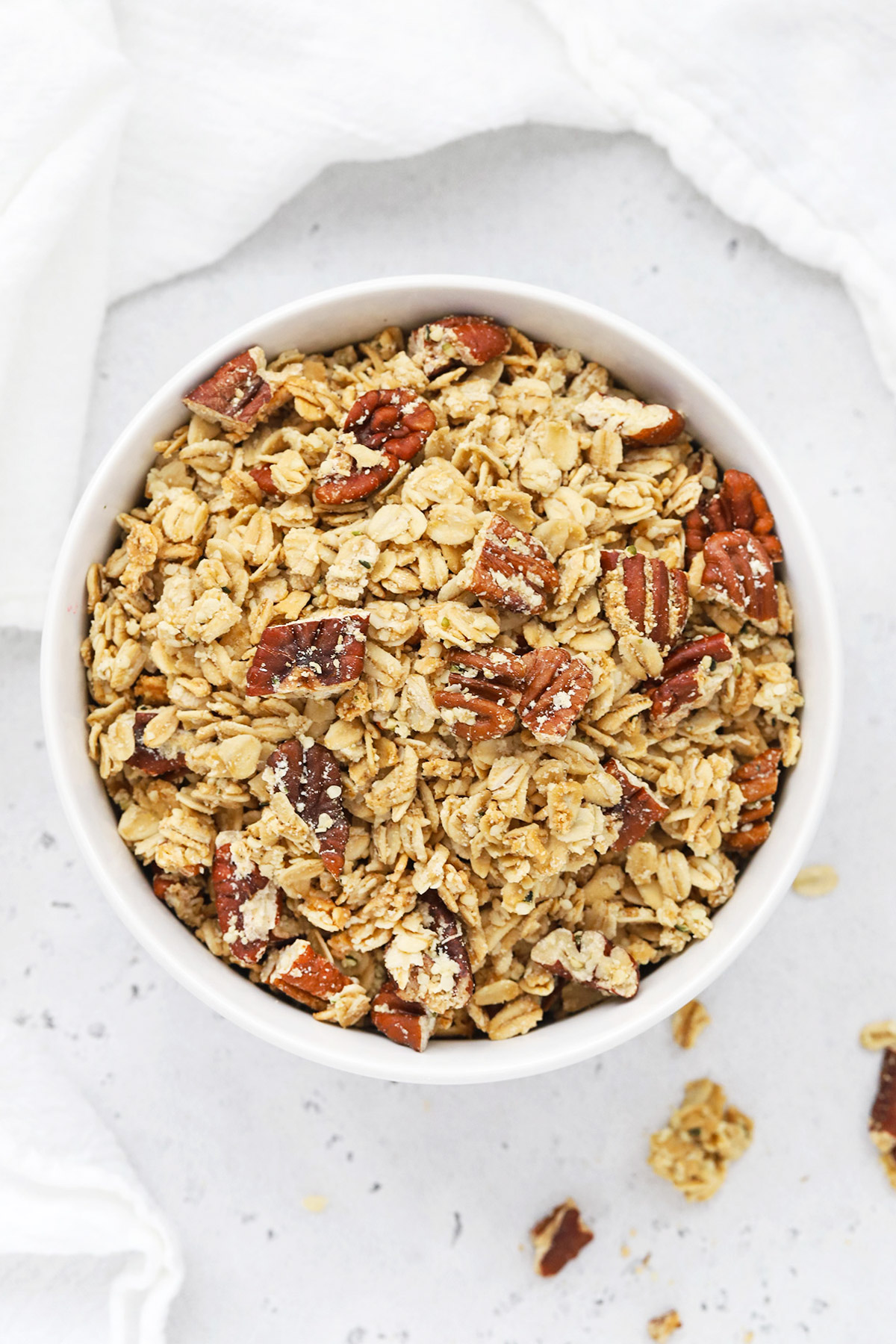 Overhead view of a bowl of homemade maple pecan granola