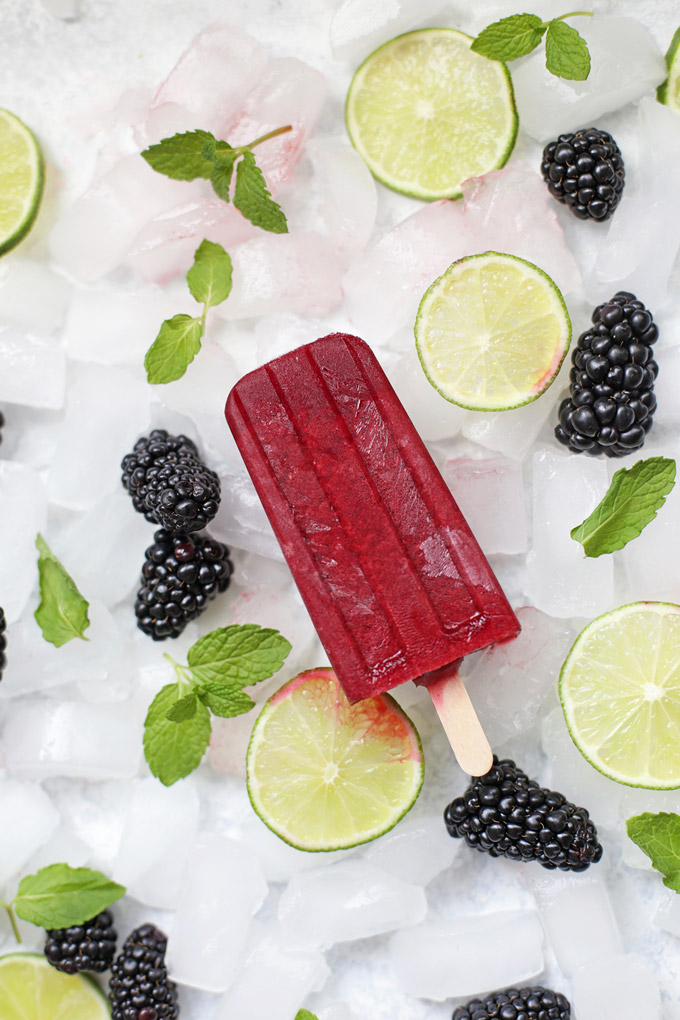 These Blackberry Mojito Popsicles are like the best berry limeade of your life with a tiny kiss of mint. SO GOOD! (Naturally sweetened, too!) 