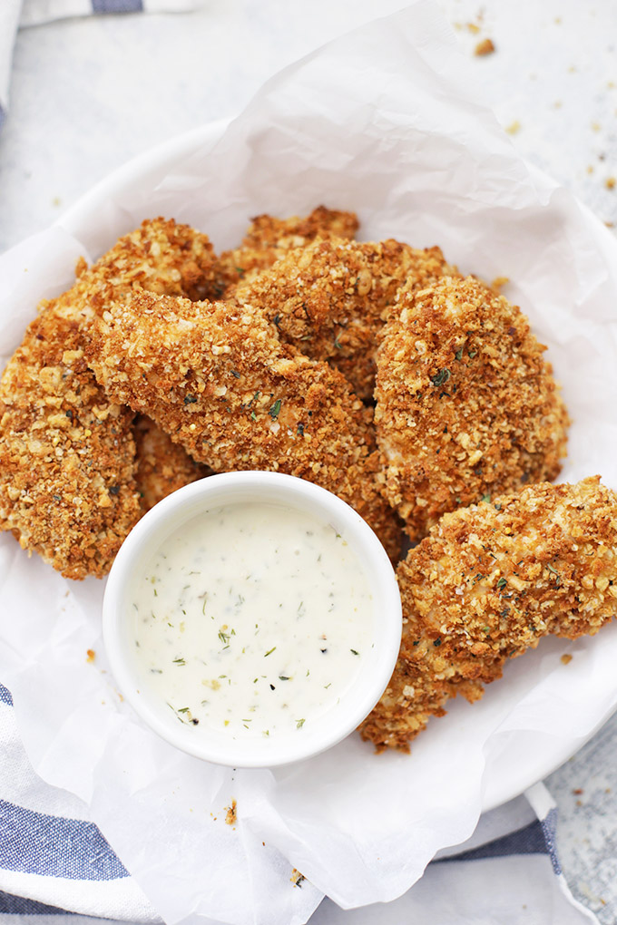 The BEST Gluten Free Crispy Chicken Tenders - Baked chicken tenders with a super crispy crunchy topping. These are AMAZING! 
