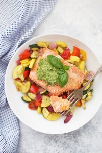 Sheet Pan Pesto Salmon and Veggies - There's nothing easier than a one pan dinner! This sheet pan meal is a family favorite, loaded with color and flavor!