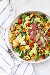 The star of this gorgeous salad is totally the avocado green goddess dressing. It's bright, tangy, and LOADED with flavor. Serve over steak, chicken, shrimp, and more! (Gluten free, dairy free)