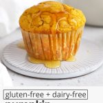 Gluten-Free cornbread muffin being drizzled with honey with text overlay that reads "gluten-free + dairy-free pumpkin cornbread muffins: light + fluffy + delightful"