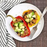 Taco Quinoa Stuffed Peppers - These vegan stuffed peppers have an amazing quinoa filling with a taco twist. So much flavor, so very good for you.