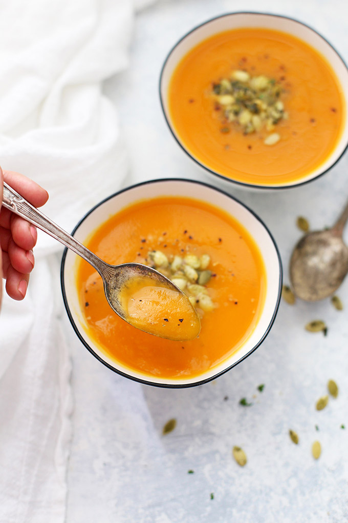 Instant Pot Ginger Carrot Soup - so smooth and delicious! Love how fast this comes together. (Vegan, paleo, and whole30 approved) - also has stovetop and slow cooker instructions. 