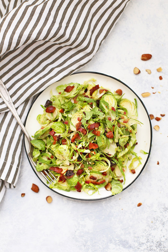 Bacon Brussels Sprouts Salad with Cherries and Almonds - This bright dressing will keep you coming back for more! (Paleo, gluten free, whole30 friendly)