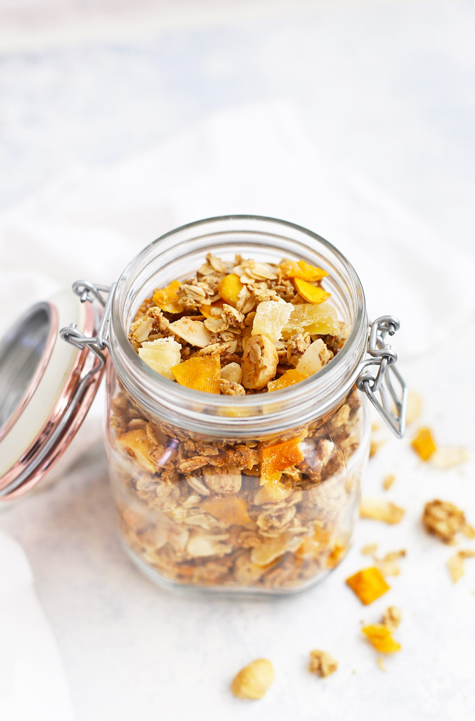 Tropical Coconut Granola with Mango and Pineapple - This Gluten free, vegan granola is INCREDIBLE! Such a good homemade granola recipe! 