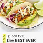 Front view of fish tacos with text overlay that reads "(gluten-free) The BEST EVER Fish Tacos with Honey Lime Slaw. So Many 5-Star Reviews!"
