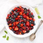 Cherry Berry Fruit Salad with Lime Mint Dressing - Strawberries, blackberries, blueberries, and cherries with lime mint dressing.
