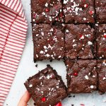 Hand taking a gluten free peppermint brownie