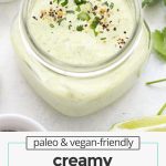 Creamy cilantro lime ranch dressing in a jar garnished with fresh cilantro