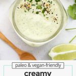 Creamy cilantro lime ranch dressing in a jar garnished with fresh cilantro