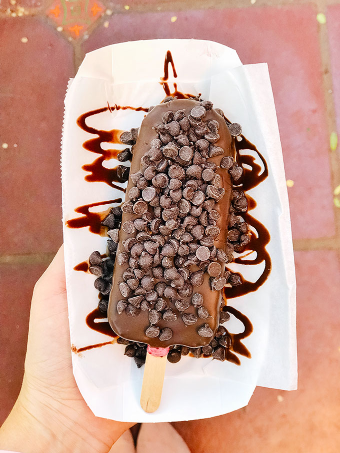 Hand Dipped Mixed Berry Sorbet Bar with Dark Chocolate and Chocolate Chip Morsels from Clarabelle's Ice Cream Parlor in California Adventure Park
