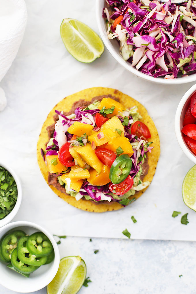 Overhead view of Black Bean Tostada with Mango Salsa from One Lovely Life