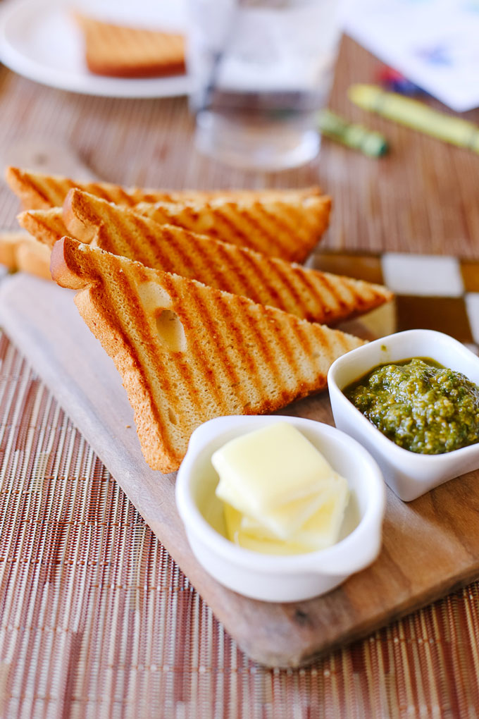 Grilled gluten free bread with butter and house made pesto from Omni Resort and Spa at Montelucia in Scottsdale, Arizona