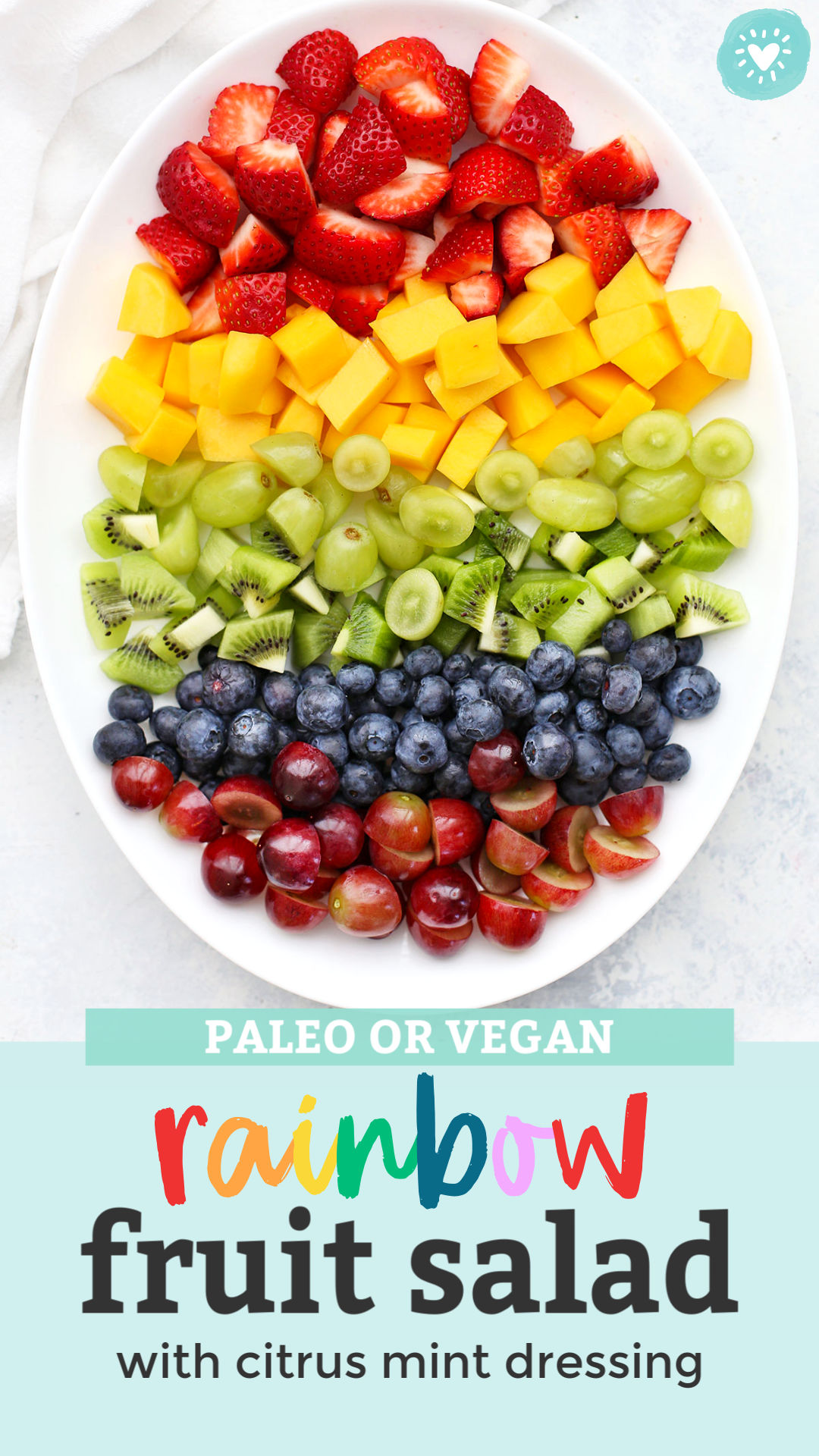 The Best Rainbow Fruit Salad with Citrus Mint Dressing - This rainbow fruit salad is always a favorite with kids and grown-ups. Perfect for picnics, potlucks, brunches, barbecues, and more! (Gluten free, paleo & vegan friendly) // rainbow fruit salad // honey mint dressing // citrus mint dressing recipe // fruit salad with dressing // the best fruit salad recipe #fruitsalad #rainbow #rainbowfood #rainbowparty #rainbowfruitsalad #citrus #mint #brunchrecipes