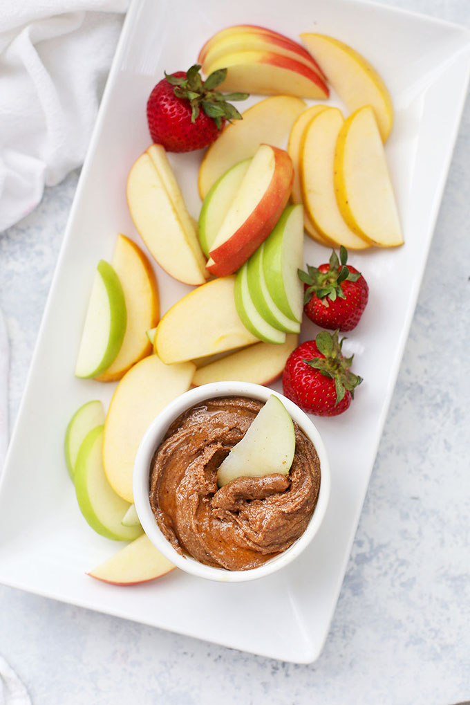 Honey Vanilla Flavored almond Butter with Sliced Apples and Strawberries for Dipping