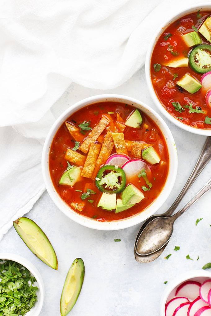 Vegetarian Tortilla Soup with tortilla strips and avocado from One Lovely Life