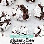 Overhead view of gluten-free chocolate crinkle cookies on a white background with text overlay that reads "the best ever gluten-free chocolate crinkle cookies. Dairy-free + so chocolatey!"